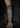 bold lines ornamental tattoo on the forearm