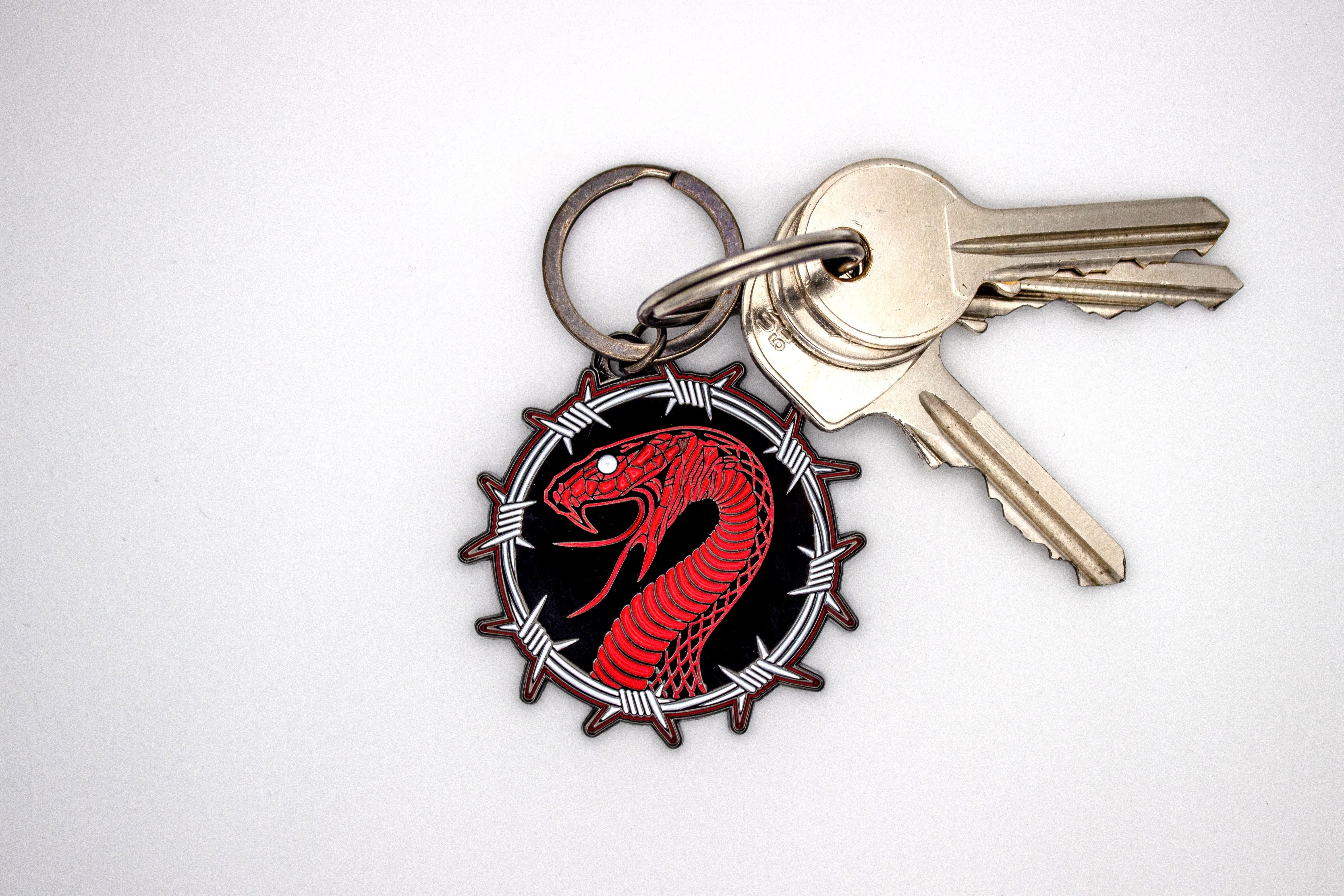 Front view Red Serpent Keyrings by Joao Bosco 